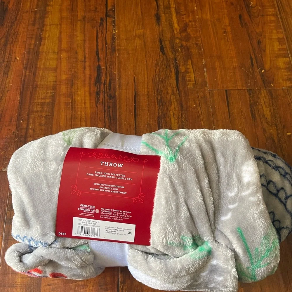 Wondershop Holiday Throw Blanket with Red, Green, and Blue Accents